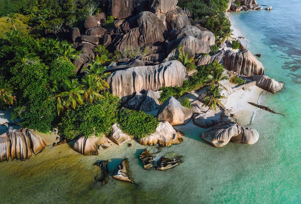 aerial photo of seychelles tropical beach anse sou small